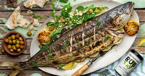 Learn How to Braai a Whole Fish, Covered in Garlic .